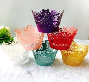 Laser-cut rose lace cupcake wrappers in multiple colors including purple and white