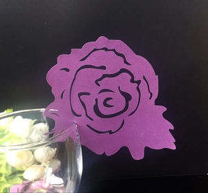 Purple laser-cut paper rose card butterfly decoration for glass rim on black background