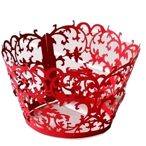 Vibrant red laser-cut cupcake wrapper with intricate filigree pattern for wedding decoration