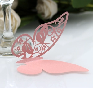 Elegant laser-cut pink butterfly paper decorations for wedding party wine glass décor