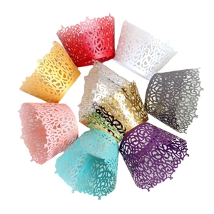 Lace hollow cupcake wrappers in multiple metallic colors for wedding cake decorations