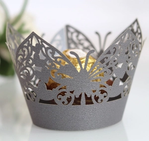 Laser cut butterfly cupcake wrapper in pearlescent grey for wedding party decoration