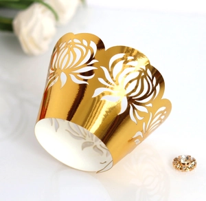 Elegant gold laser cut floral cupcake wrappers for wedding and party cake decoration