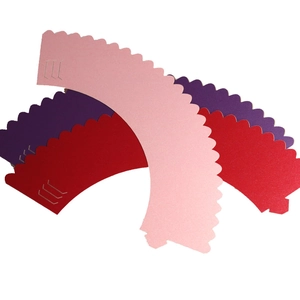 Set of pink, red and purple wavy edge paper cupcake wrappers for wedding parties