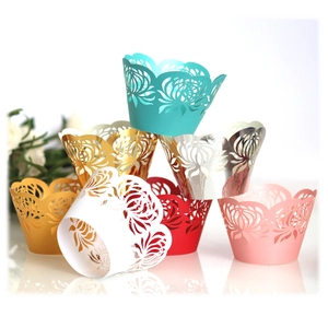 Laser cut floral cupcake wrappers in various metallic colors for wedding party decoration