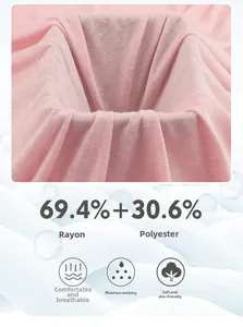 Pink breathable rayon-polyester fabric detail showing moisture-wicking properties