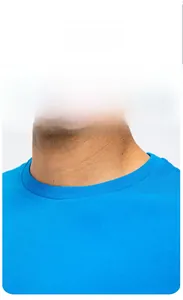 Detail of blue cotton T-shirt classic round neckline with precise ribbed stitching