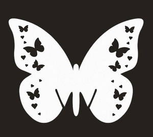 Intricate laser-cut white butterfly place cards with hollow heart patterns for wedding decor
