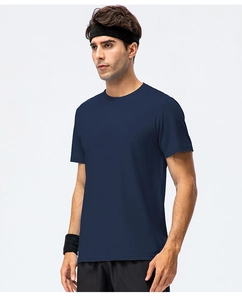 Detailed view of dark blue cotton sports t-shirt with crew neck on male model