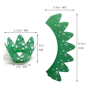 Detailed dimensions of green laser-cut cupcake wrappers with delicate snowflake patterns