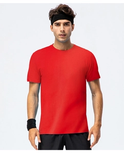 Detailed view of red cotton t-shirt with crew neck and breathable knit fabric texture