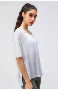 Detail of white semi-transparent breathable mesh workout t-shirt for women running