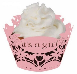 Pink cupcake wrapper with hollow flower patterns and It's a Girl text for baby party