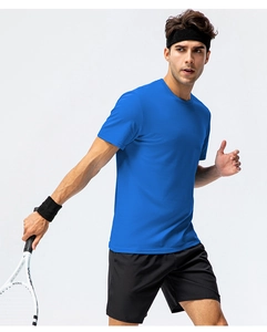 Detail of royal blue crew neck cotton t-shirt worn by an athlete with a tennis racket