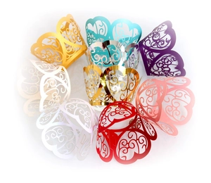 Laser cut heart cupcake wrappers in various metallic colors for wedding party decoration