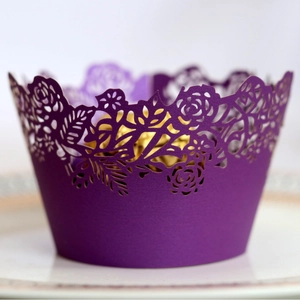 Elegant deep purple laser cut cupcake wrappers with intricate rose flower hollow patterns