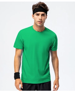 Close-up of grass green cotton t-shirt with classic crew neck for sports and casual wear