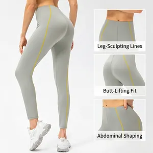Pantalon de yoga gris taille haute avec coutures jaunes et coupe sculptante
