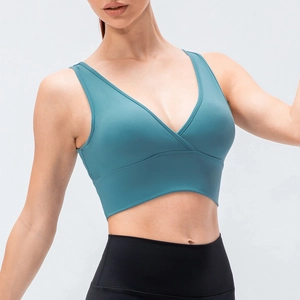 Brassière de yoga col en V bleu sarcelle et leggings noirs pour fitness et sport