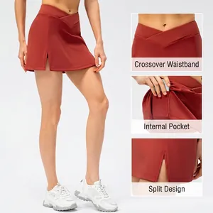 Women's cross high-waisted tennis skort in dark red with side slit and inner pockets