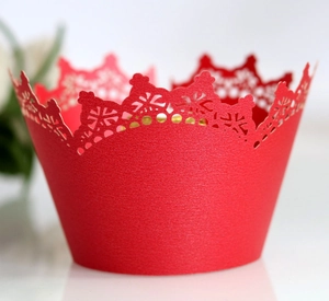 Elegant red crown laser-cut cupcake wrappers with intricate hollow design for weddings