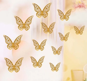 Detailed view of 12pcs golden hollow 3D butterfly wall stickers with laser-cut patterns