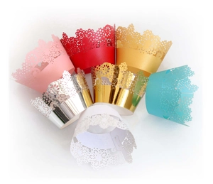 Laser-cut hollow cupcake wrappers in multiple colors with intricate floral lace patterns