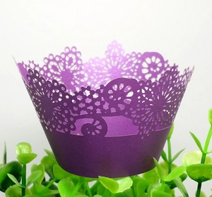 Detailed laser-cut dark purple lace cupcake wrapper with floral pattern for wedding party