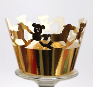 Golden laser cut cupcake wrappers with bear and horse patterns for party cake decoration