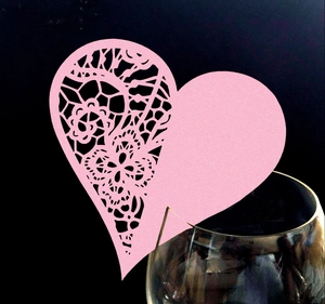Pink heart laser-cut lace wine glass card with intricate floral patterns for weddings