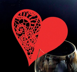 Laser-cut red heart wine glass place cards with intricate floral hollow lace patterns