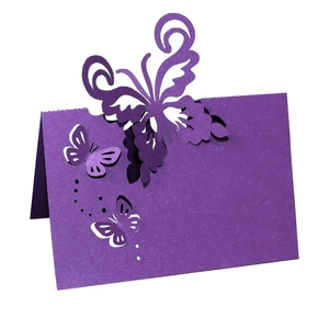 Laser-cut purple butterfly place card with glitter finish for wedding table decor