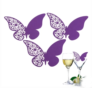 Elegant purple laser-cut butterfly cards for wine glass decoration in party settings
