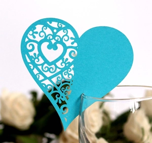 Laser-cut heart-shaped wine glass card with turquoise floral vine hollow pattern