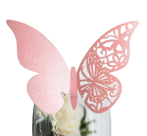 Pink glitter butterfly place card with laser-cut hollow design for wedding wine glasses