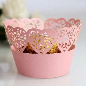 Elegant laser-cut pink heart cupcake wrappers for wedding and party decorations