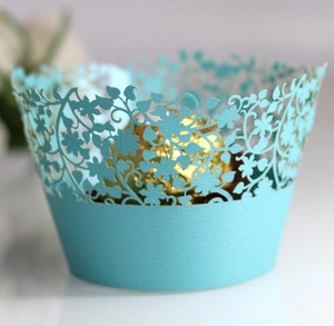 Laser-cut floral cupcake wrapper in light blue for wedding and party decorations