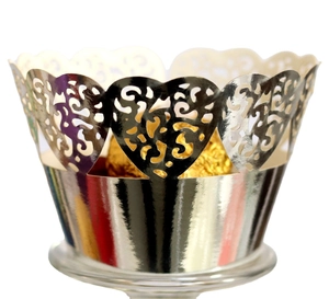 Silver laser-cut heart cupcake wrapper with elegant metallic lace pattern for weddings