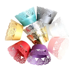 Laser-cut heart pattern cupcake wrappers in multiple colors for wedding party decoration
