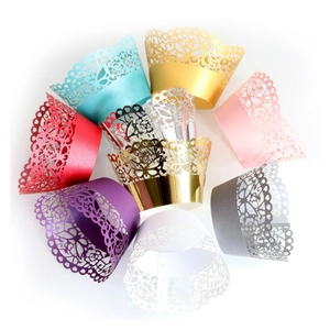 Laser-cut cupcake wrappers with floral patterns in multiple metallic and pastel colors