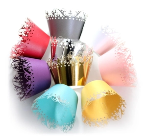 Multi-color laser-cut lace cupcake wrappers for weddings and parties, bird-eye view