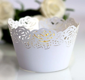 Detailed laser cut white rose lace cupcake wrappers for wedding and party decorations