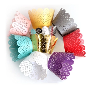 Laser cut floral cupcake liners set in vibrant multi-colors for festive party decor