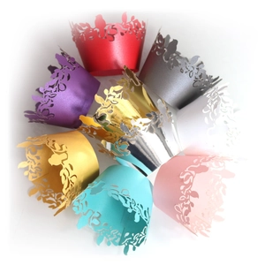 Laser-cut bird and leaf cupcake wrappers in multiple metallic colors for weddings