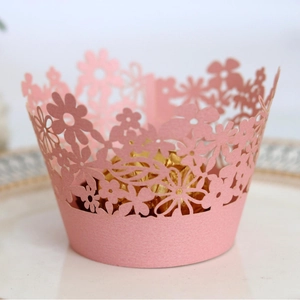 Pink laser-cut floral cupcake wrapper with pearlescent finish for party decoration