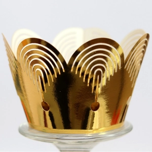 Laser-cut gold metallic lace muffin cupcake wrappers with elegant hollow arch design