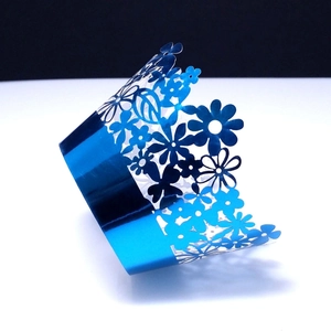 Blue laser-cut cupcake wrappers with floral hollow design for wedding and party decor