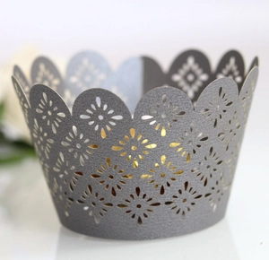 Dark gray laser-cut cupcake wrappers with elegant petal pattern for wedding decoration