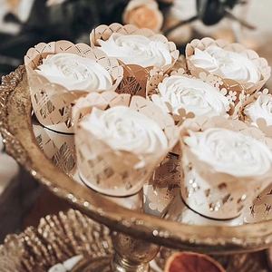 Laser cut champagne gold cupcake wrappers with floral hollow design for party decor