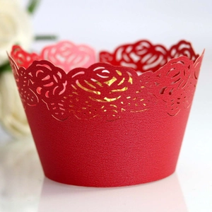 Laser-cut red rose pattern cupcake wrappers with a pearl finish for wedding decor